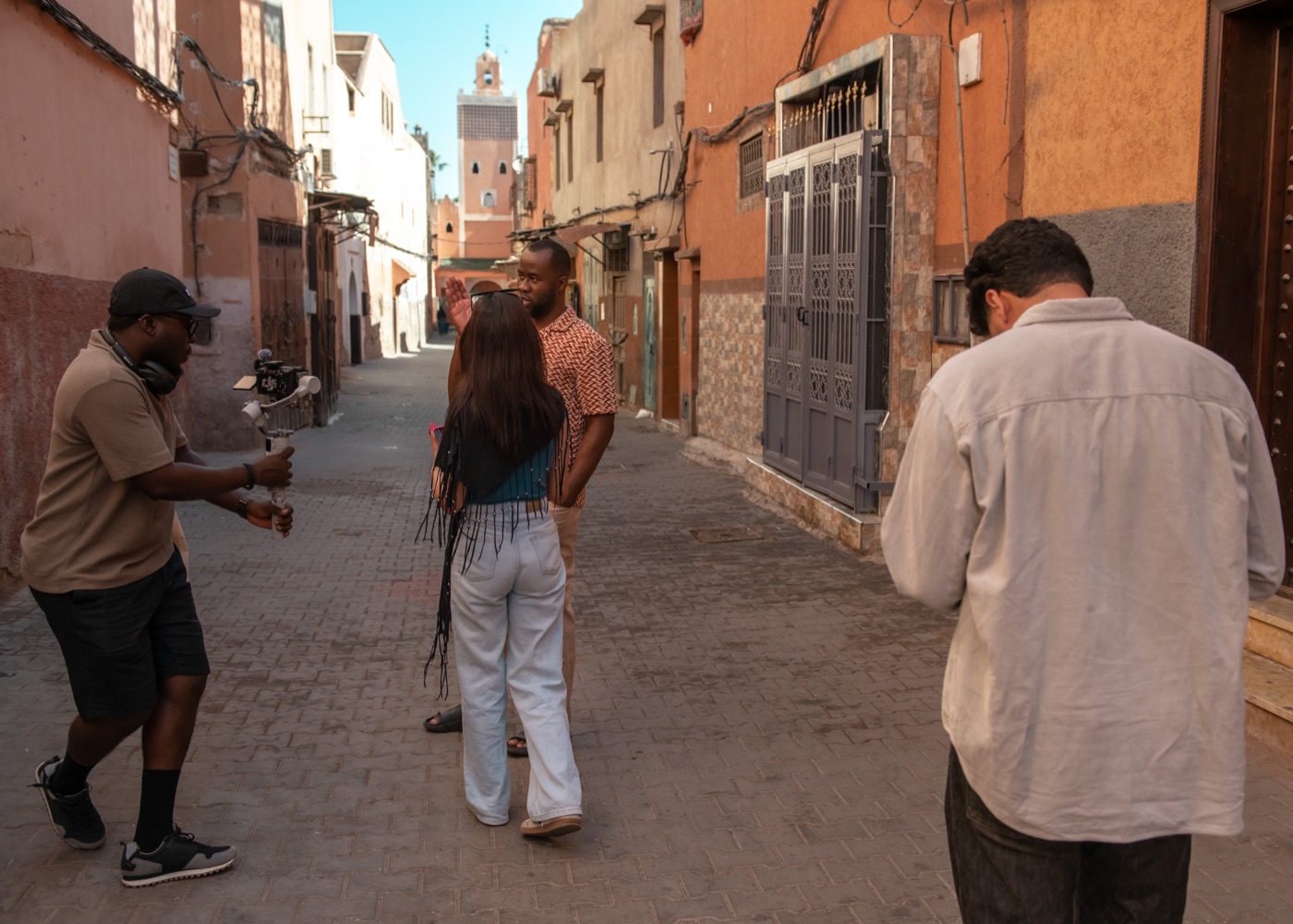 Filming a walking scene in a narrow Medina street