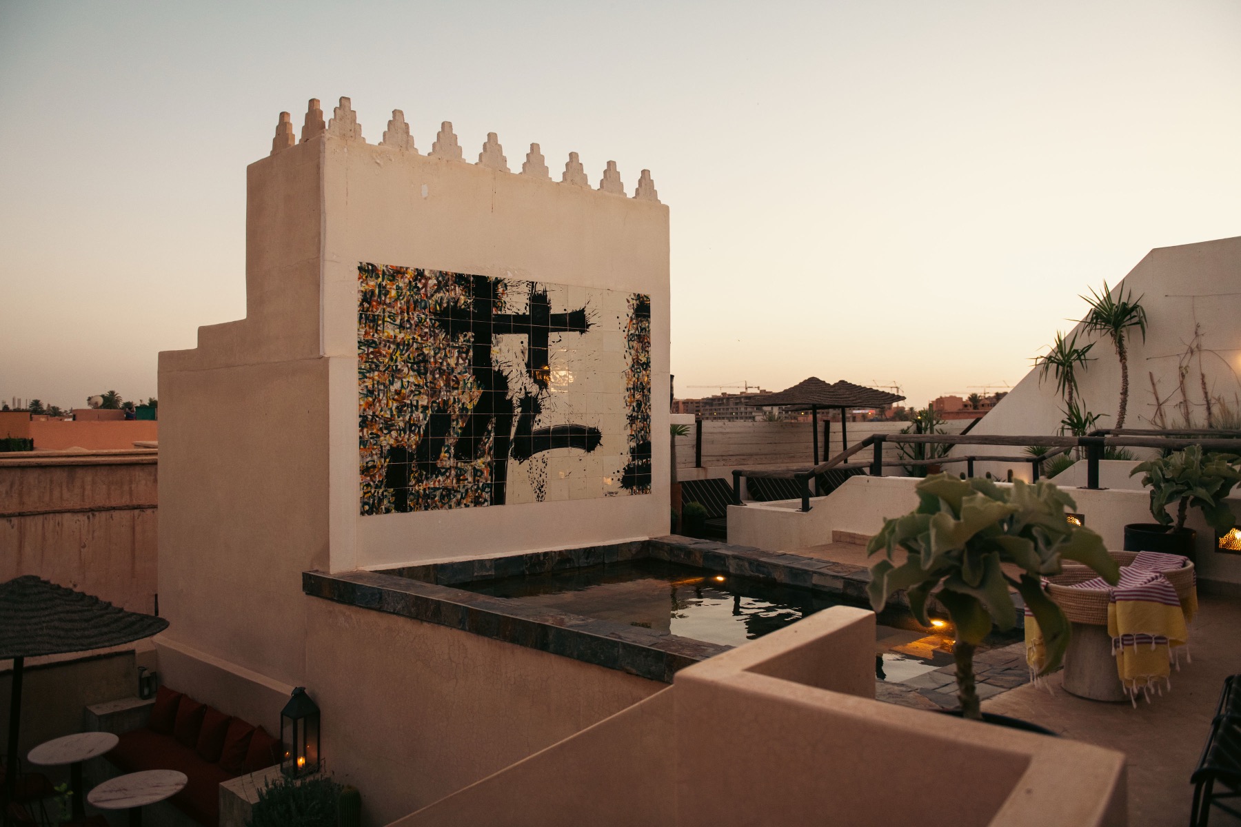 Riad El Aaiún — the rooftop terrace and pool at dusk